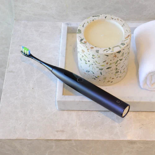 Kan du tage en electric toothbrush med på et fly?